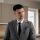 Real estate agent presenting in a stylish indoor setting. Ideal for business and real estate themes